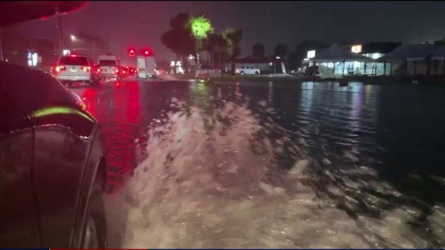 Heavy rain floods Central Florida as rescue crews deploy to Panhandle ahead of Hurricane Isaias