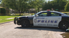Suspect dies in police car after Love Field robbery