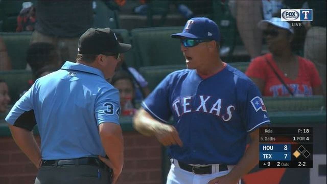 The Texas Rangers' Adrian Beltre and his son, Adrian Jr., 8, walk