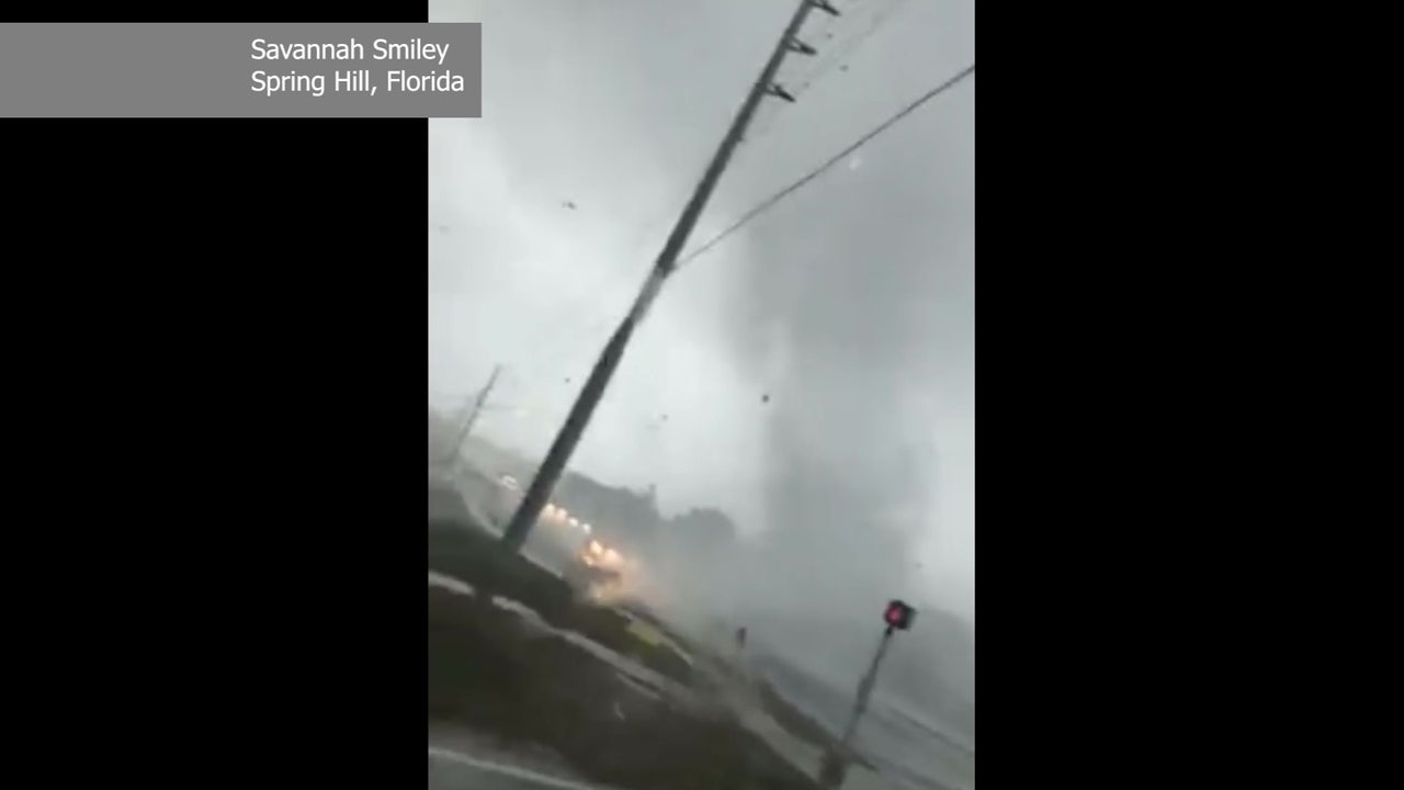 Watch Tornado crosses intersection in Spring Hill
