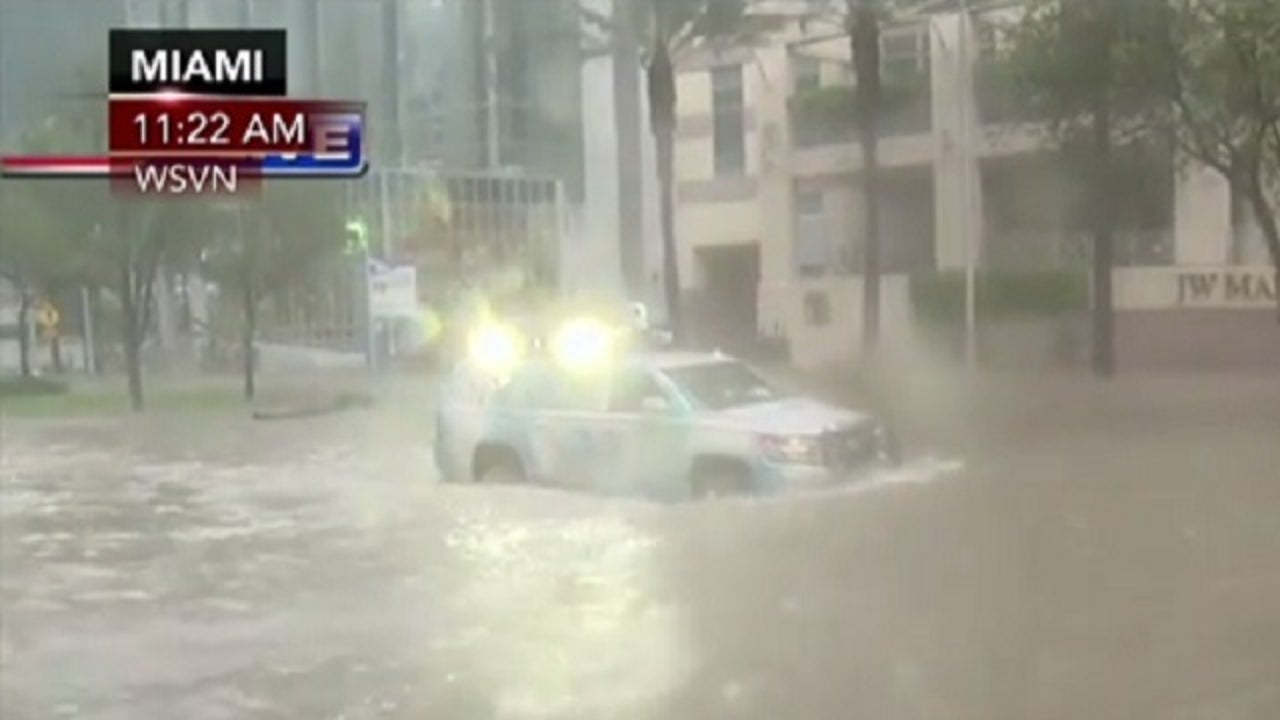 VIDEO: Weather channel van almost floats away in Miami