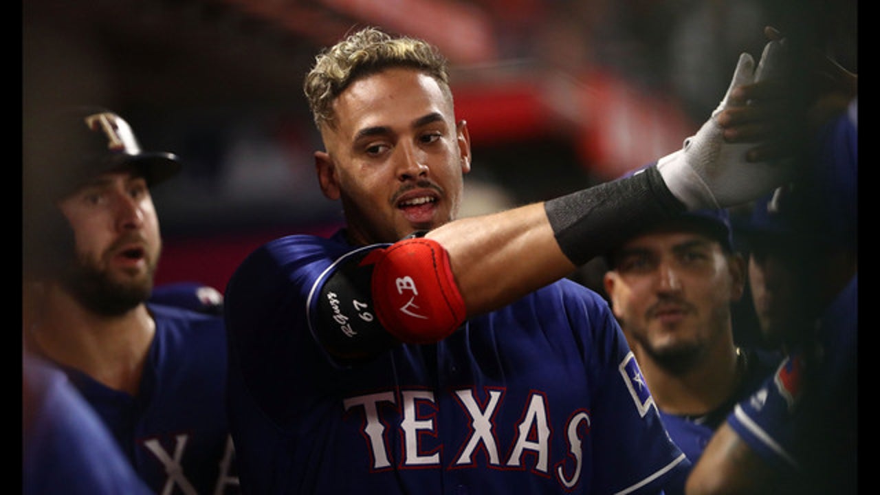 Rangers send Ronald Guzman to IL, recall Patrick Wisdom to split