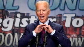 Biden defends past civil rights record after Harris attack