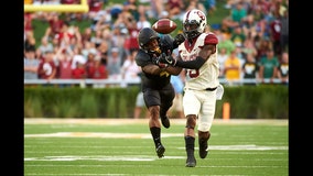 No. 3 Oklahoma overcomes Baylor 49-41 for 14th straight win