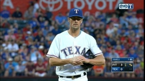 Hamels' 12-game win streak ends as Pirates top Rangers 9-1