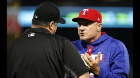 Rangers exercise '19 option on Banister, fire bullpen coach