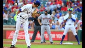 Fister exits with injury as Astros top Rangers 7-3