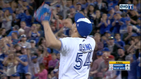 Travis hits grand slam, Blue Jays beat Rangers 7-6