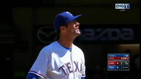 Calhoun helps Angels stop Rangers' 4-game winning string