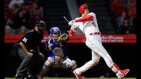 Angels rally with four in sixth, top Rangers 4-1