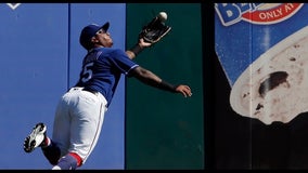 Rangers OF Calhoun on 10-day injured list with quad strain