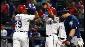 Beltre shines as Rangers top M's 8-3 in rain-shortened game