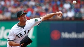 Hammel outpitches Hamels as Royals beat Rangers 5-3