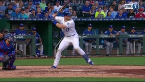 Royals score early, blow out Rangers 11-5 in series opener