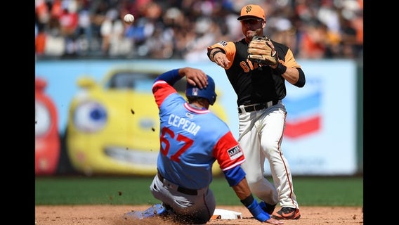 Giants nearly blow another big lead, hold off Rangers 5-3