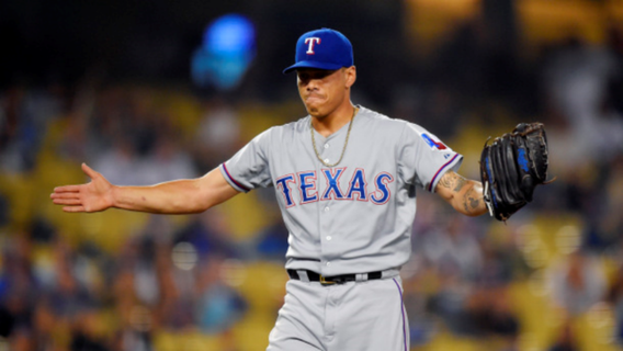 Rangers unexpectedly send reliever Keona Kela to Triple-A