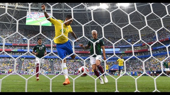 Brazil fan who is deaf, blind follows World Cup with help