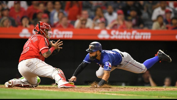 Odor dives home in 10th to lift Rangers over Angels 3-2