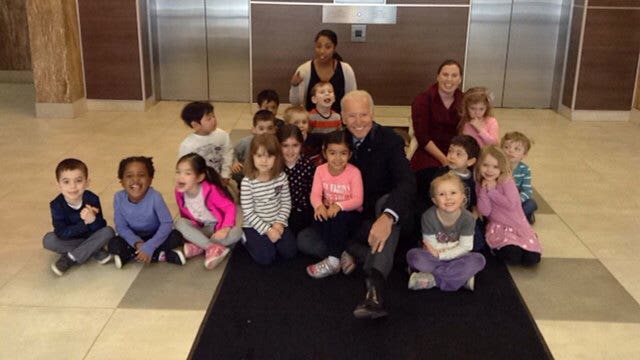 Former VP Joe Biden surprises preschoolers, takes fun group photo together with them