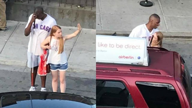 Good Samaritan caught on camera helping blind Cubs fan catch a cab