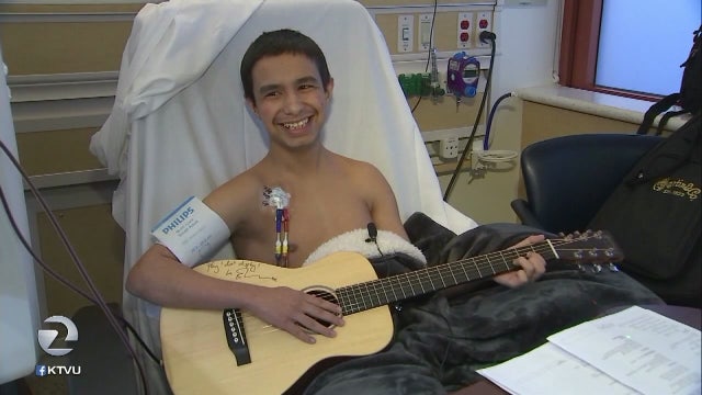 Boy, 15, receives Ed Sheeran autographed guitar from nurse while awaiting kidney transplant