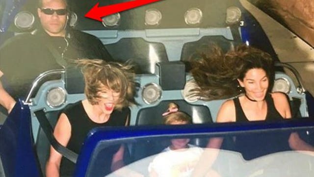 Taylor Swift's unimpressed bodyguard was the true star at Disneyland