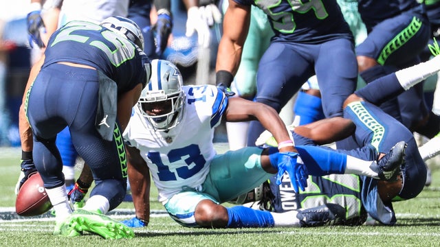 Wilson 3 TDs, Thomas 2 picks, Seahawks beat Cowboys 24-13