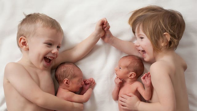 Sibling love captured in touching photo of two sets of twins