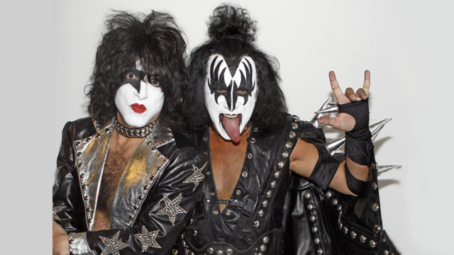 UT Austin president vs. Gene Simmons: Who did the horns symbol first?