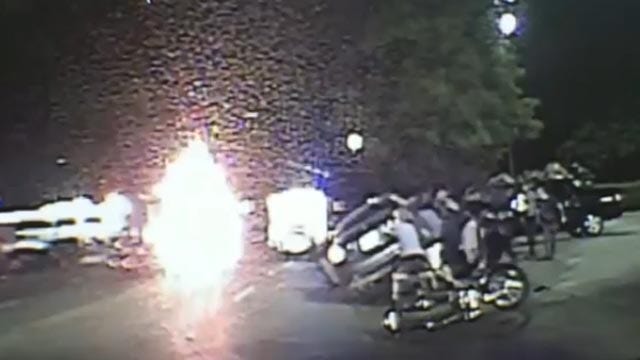 First responders lift car to save motorcyclist