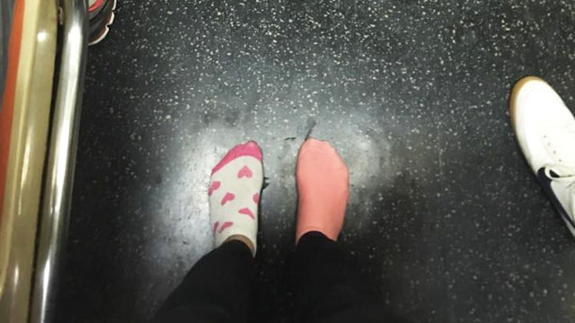 Subway rider gives barefoot, homeless woman shoes off her feet