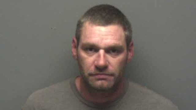 Captive woman rescued after giving UPS driver hostage note, police say