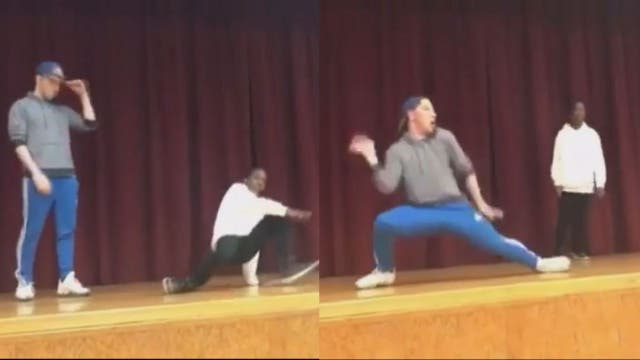 Teacher battles student in epic dance-off, tears up school's talent show stage