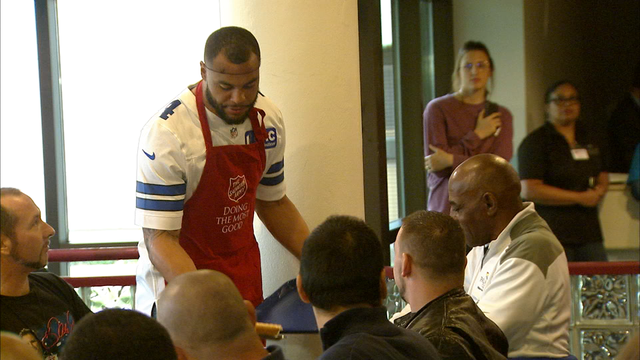 Cowboys players help serve early Thanksgiving dinner at Salvation Army