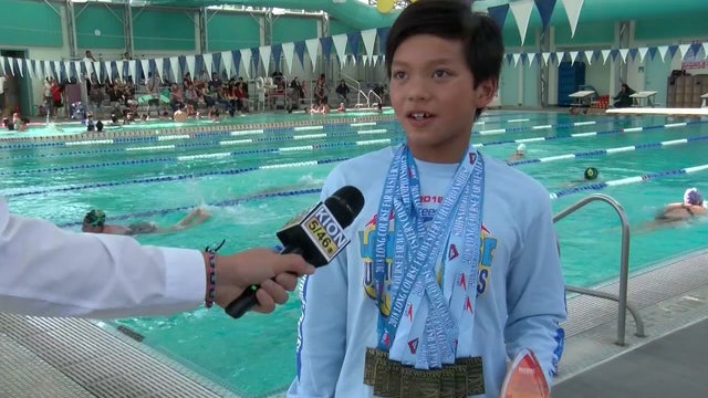 10-year-old beats Michael Phelps' 100-meter butterfly record
