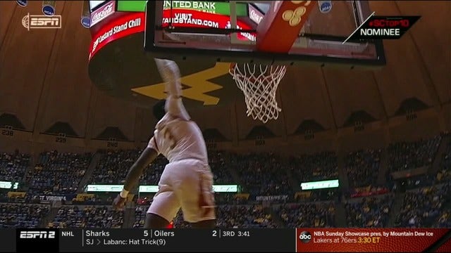 Ramey scores 19, leads Texas in 75-53 win over West Virginia