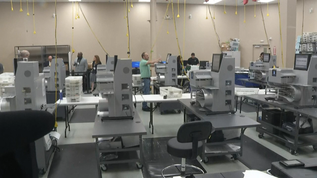 Overheating machines complicate Florida's recount battle