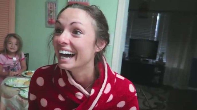 Man surprises wife with news that she's pregnant