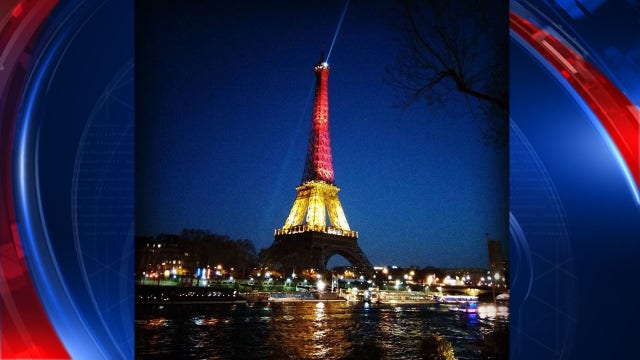 Eiffel Tower lights up in Belgian flag colors following terror attacks