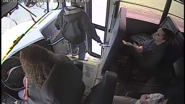 Nice save! Bus driver grabs student stepping toward car