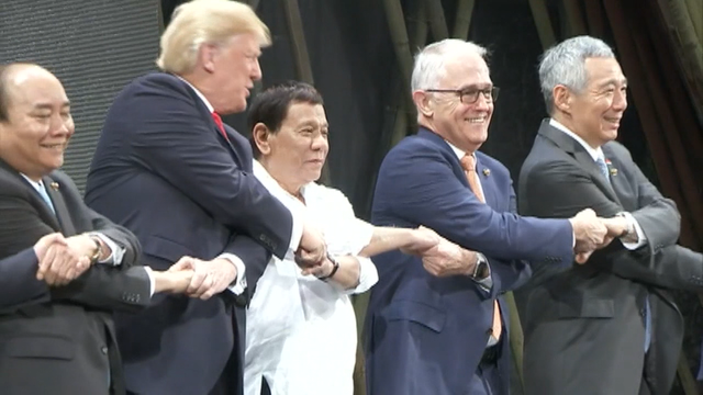 Trump embraces Duterte as Asia trip winds down
