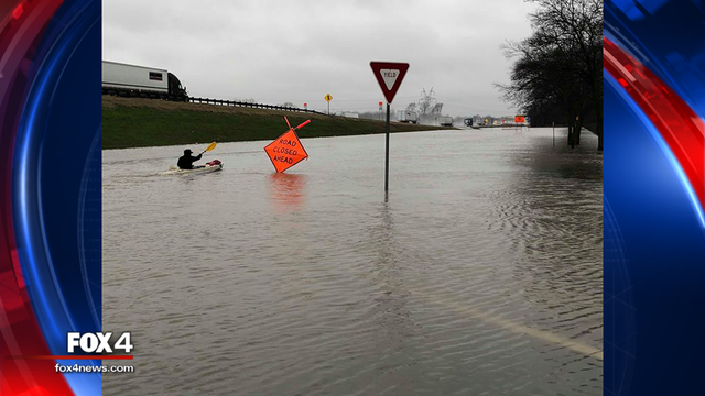 North Texas man kayaks in high water to work