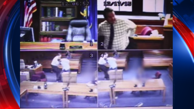 Video shows Michigan judge tossing off robes to tackle man