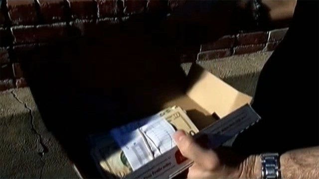 Man finds $1,300 in pizza delivery box