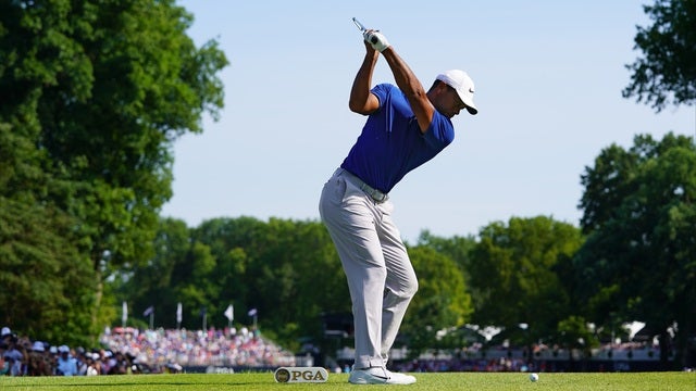 Putts won't drop, but Woods moves up the board at PGA anyway