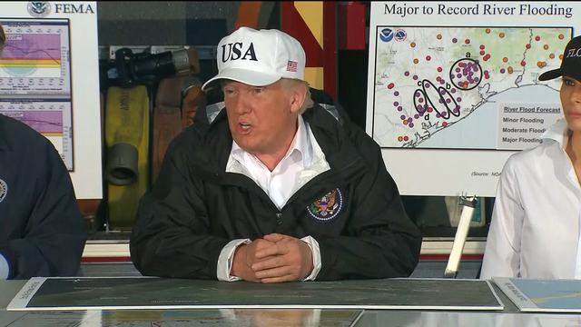 Trump offers flag-waving optimism in visit to Harvey's path