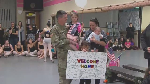 Soldier returning home for Thanksgiving holiday surprises 3-year-old daughter at dance class