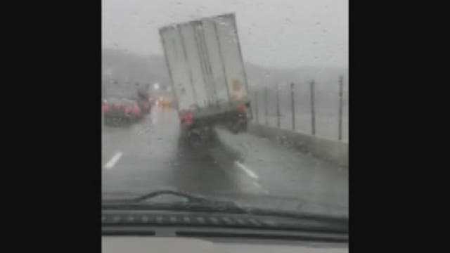Fierce winds nearly tips semi-truck over on New York bridge