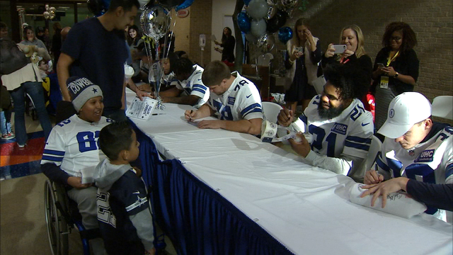 Dallas Cowboys players, cheerleaders visit children in North Texas hospitals
