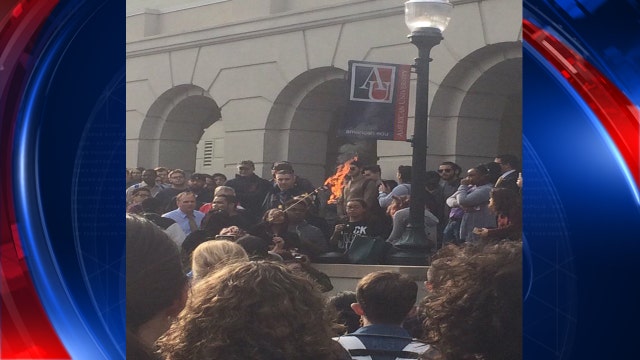 WATCH: Students burn American flags at American University to protest Trump's win